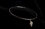 textured bangle with drop shell